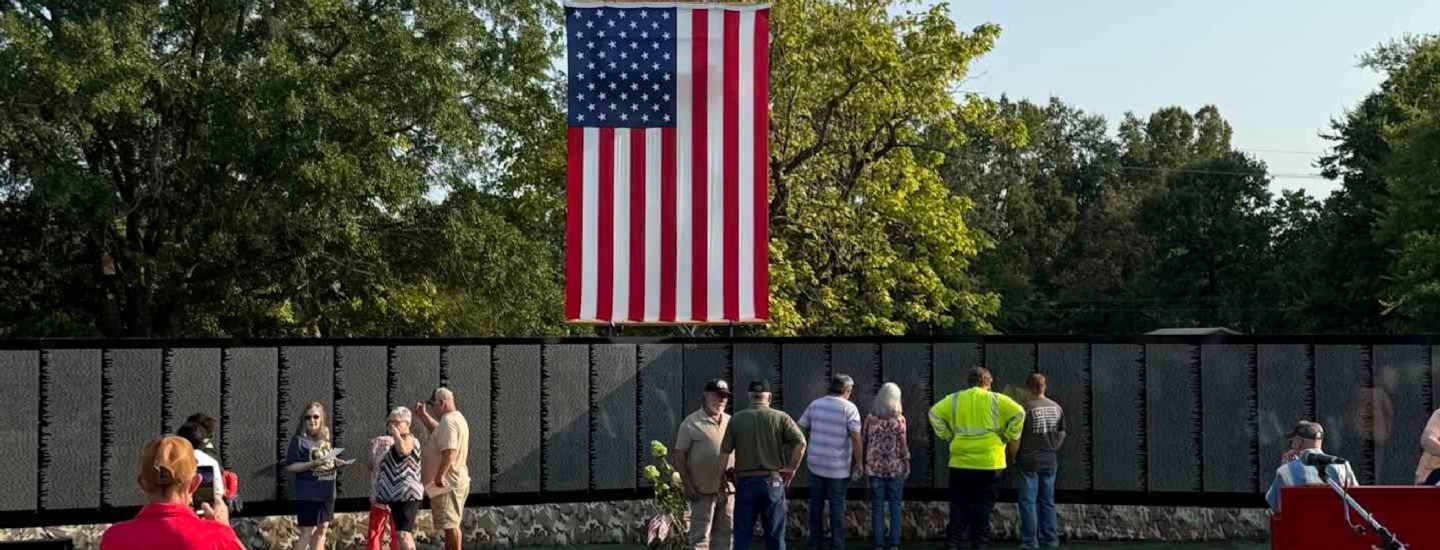 THE MOVING WALL FRONT VIEW WITH FLAG